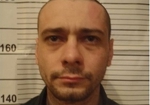 Помазун від поліцейських ховався у болоті