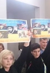 Українці в Давосі влаштували акцію протесту Пінчуку