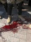 Біля Ради вшанували пам'ять бійців Нацгвардії, що загинули тут рік тому (фото)